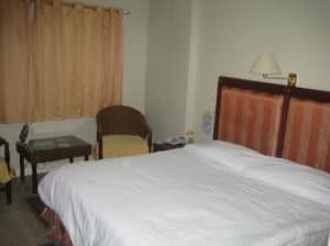 Wild orchid resort room and bed in angeles city