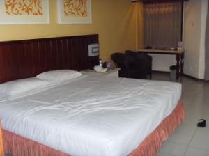 Bali Garden Beach Resort room and bed