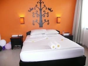 Dewi Sri Hotel room and bed