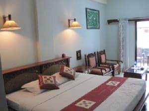 Melasti Beach Bungalows room and bed