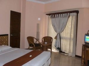 Pelangi Bali Hotel room and bed