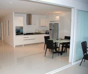Sunset Plaza Karon Phuket Kitchen and patio view