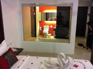 al.fres.co Phuket Hotel bed and see through toilet view